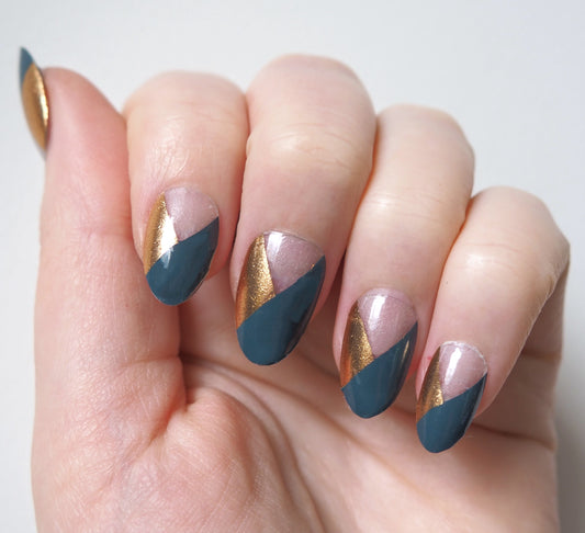 Golden Envy nail wraps use your natural nail colour to provide a geometric contrast between smoky teal and gold