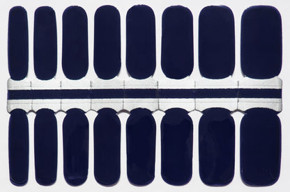 Deep navy blue nail wraps.