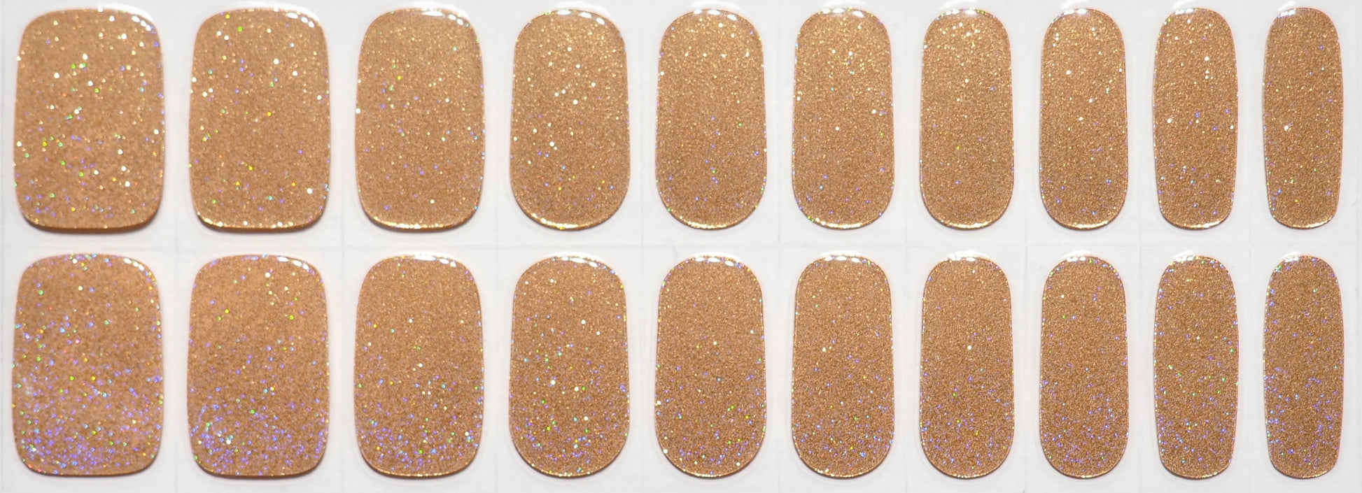Glittery gold nail wraps with a magical rainbow shimmer.